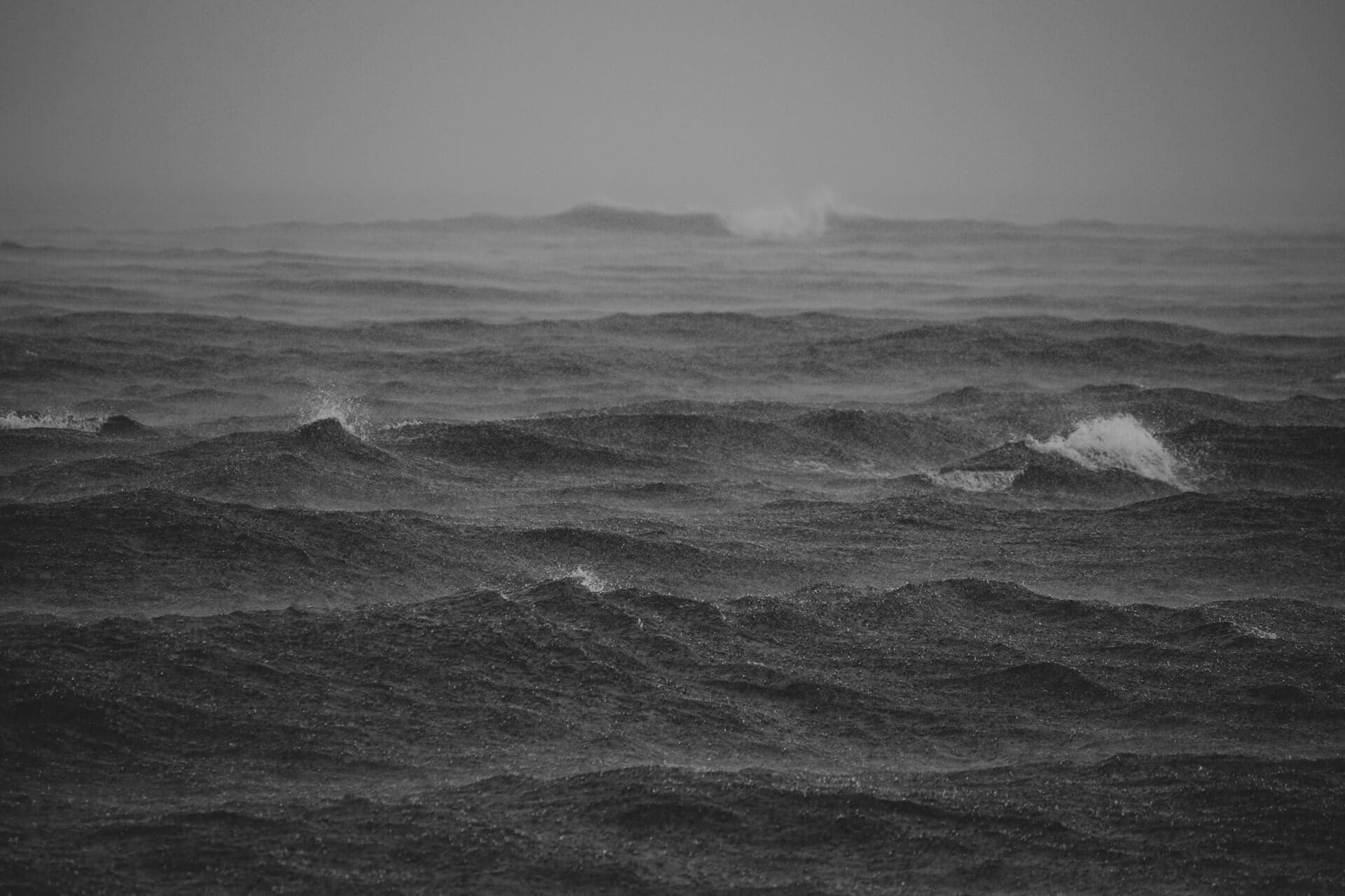 A black and white photo of a large body of water